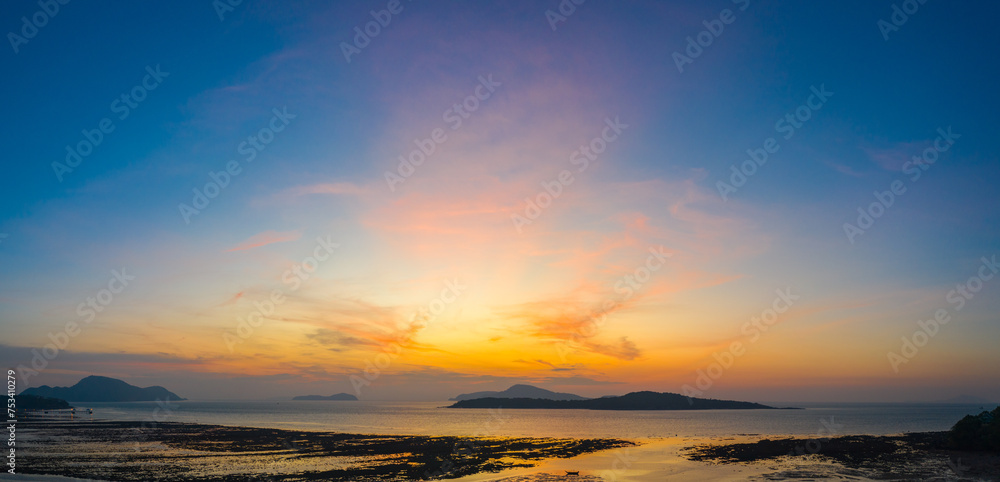 Aerial view colorful cloud at sunrise above the ocean. .Majestic sunset or sunrise landscape Amazing light of nature amazing cloud scape sky and colorful clouds moving away rolling. Aerial view colorful cloud at sunrise above the ocean. .Majestic sunset or sunrise landscape Amazing light of nature amazing cloud scape sky and colorful clouds moving away rolling.