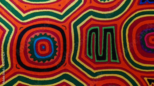 Closeup of handmade Guna mola (appliqué, trapunto) textile pattern made by indigenous tribal people 
of Panama and Colombia	
 photo