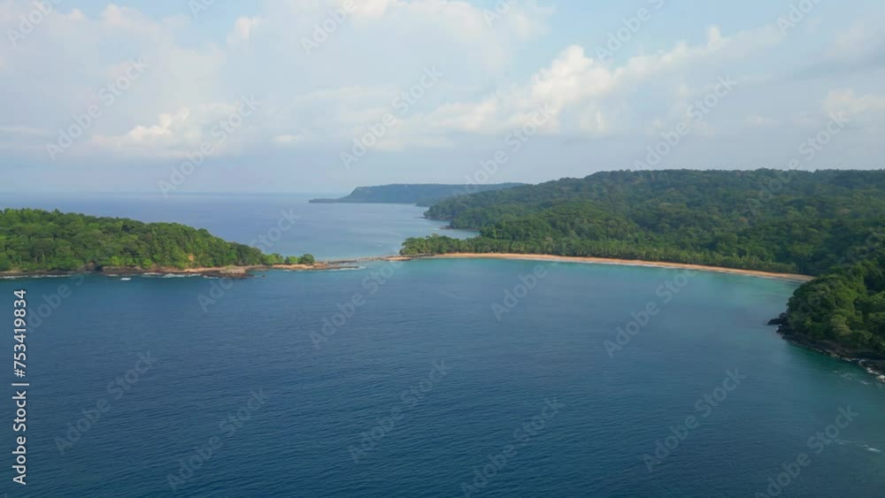 Aerial backwards view from the bom bom beach and circling to reveal the bom bom islet at Ilha do Principe (Prince island) Africa Aerial backwards view from the bom bom beach and circling to reveal the bom bom islet at Ilha do Principe (Prince island) Africa