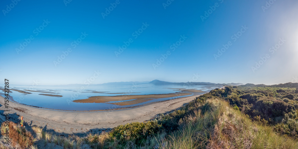 Farewell Spit : A majestic Coastal Landscape with Sand Dunes and Tasman Sea in the Golden Bay of South Island, New Zealand Farewell Spit : A majestic Coastal Landscape with Sand Dunes and Tasman Sea in the Golden Bay of South Island, New Zealand