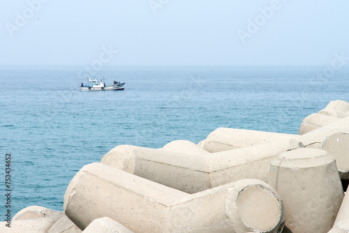 View of a fishing boat on the sea at the seaside