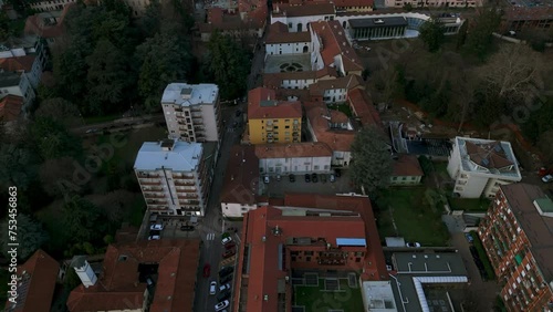 Vimercate cityscape in Italy. Aerial drone tilt-up reveal photo