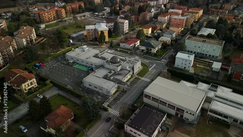 Commercial area of Vimercate in Italy. Aerial drone orbiting photo