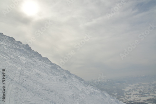 Mt Yotei steep ascent in Snow to top Views sun panorama Hokkaido Japan
