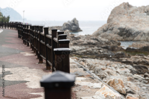 View of the wooden fence at the seaside photo