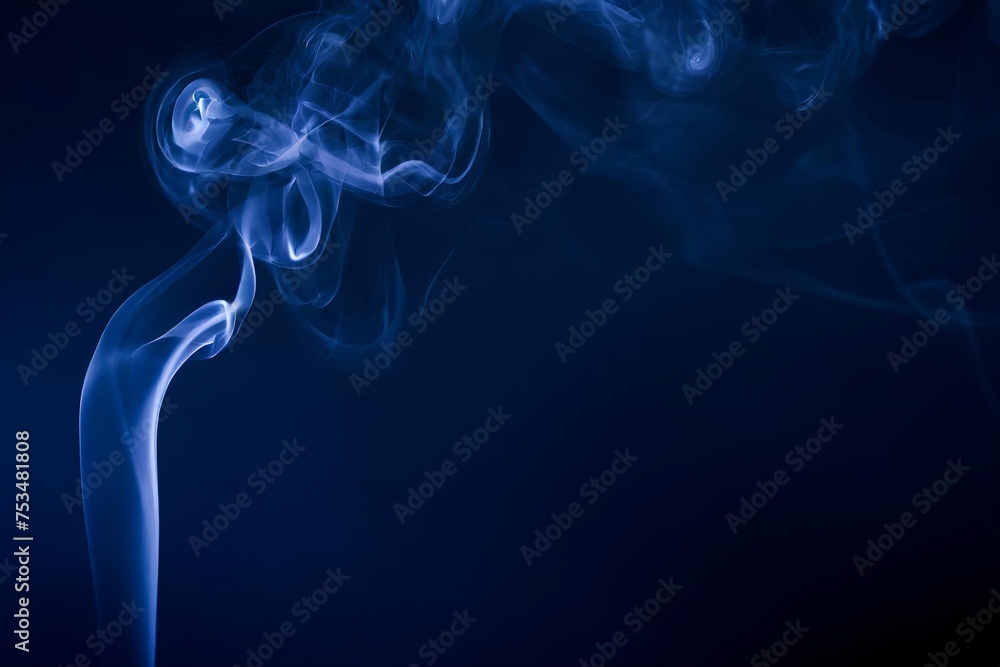 Fototapeta premium dark blue smoke flowing on minimal dark background