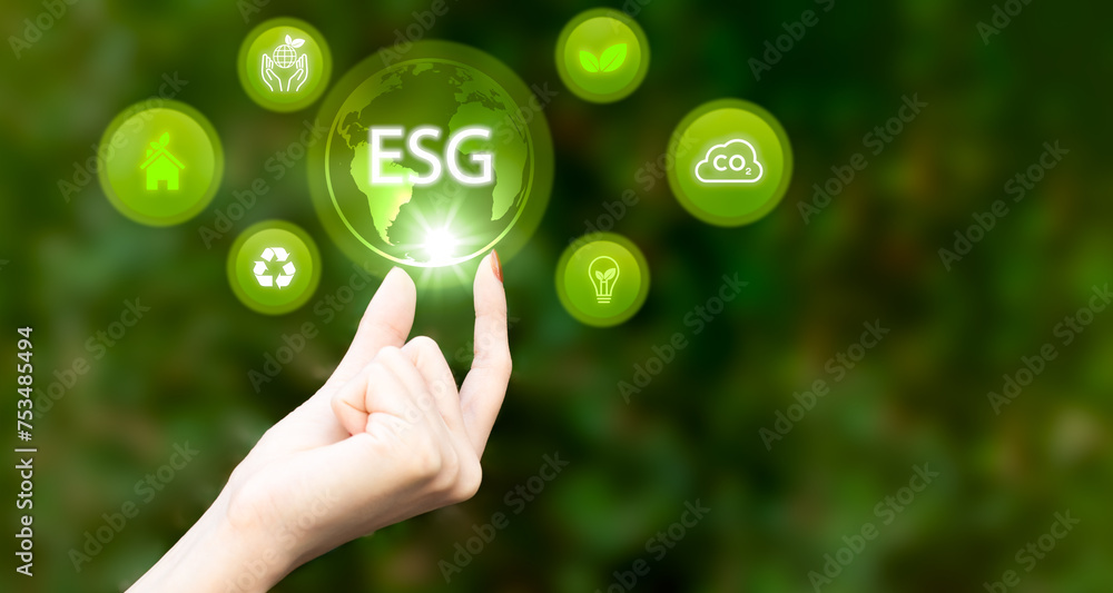 Hand of human holding green earth ESG icon for Environment Social and Governance, World sustainable environment concept. Hand of human holding green earth ESG icon for Environment Social and Governance, World sustainable environment concept.