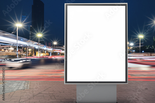 blank white billboard On the sidewalk at night