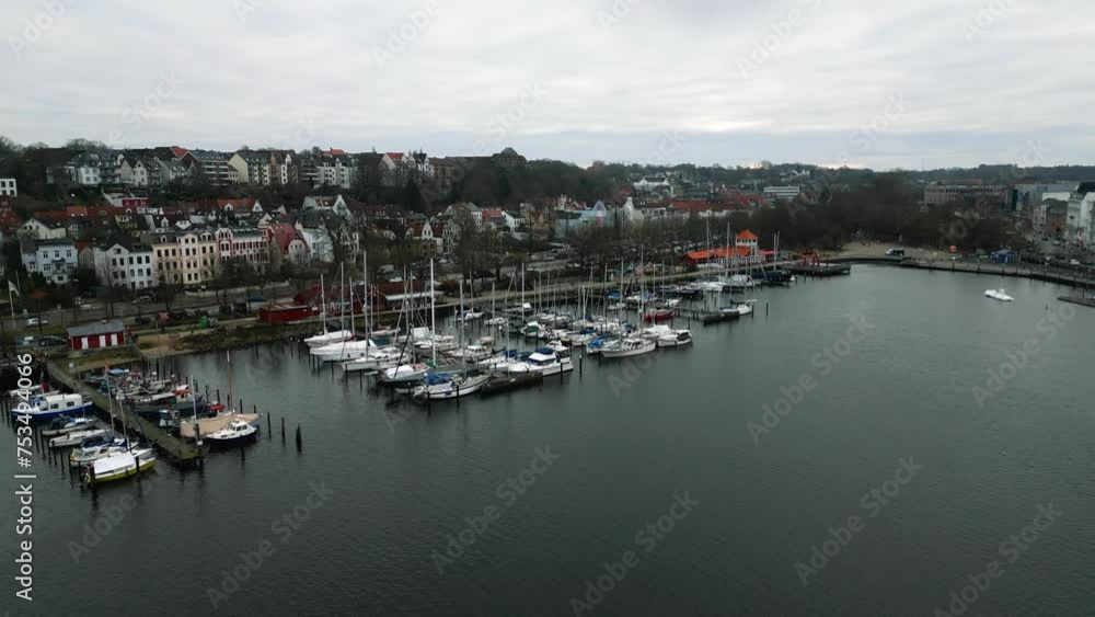 Drone Flight towards the harbour of the historic city in Flensburg, Germany Drone Flight towards the harbour of the historic city in Flensburg, Germany