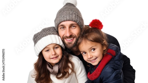 A family of three smiling in winter hats
