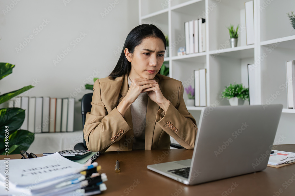 Young woman overworked exhausted of use a laptop, Burnout frustrated with anxiety problems sitting at home office Young woman overworked exhausted of use a laptop, Burnout frustrated with anxiety problems sitting at home office