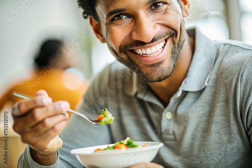 Close-up of Smiling Man Enjoying Healthy Meal
