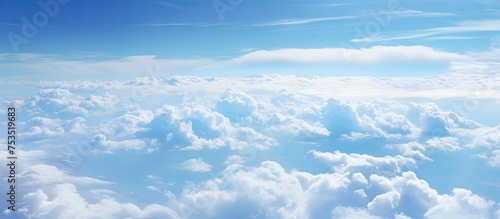 Spectacular Aerial View of the Clouds Seen from a Commercial Flight Above Earth's Atmosphere photo