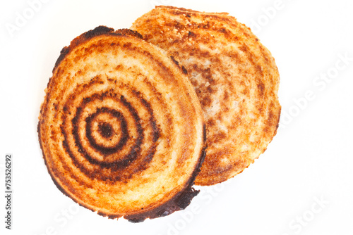 Jaffle, an old school toasted sandwich, filled with savory mince. Isolated on white with copy space photo