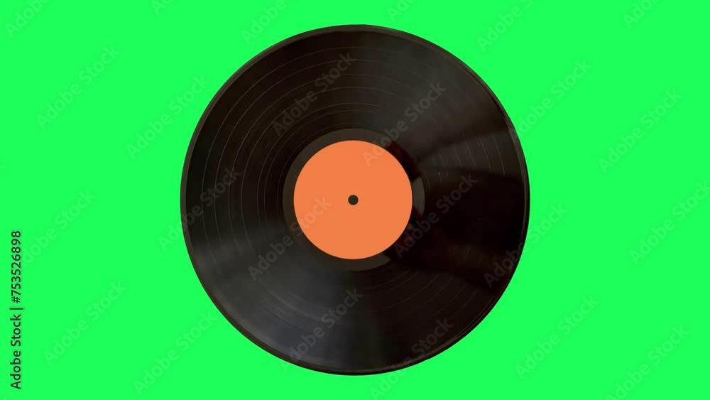 LP old vinyl record spinning on the green screen. Top view. LP old vinyl record spinning on the green screen. Top view.