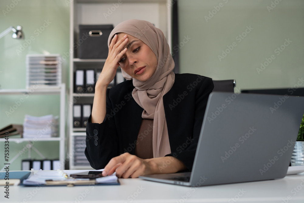 Stress businesswoman is sitting at table, under stress from working. Stress businesswoman is sitting at table, under stress from working.