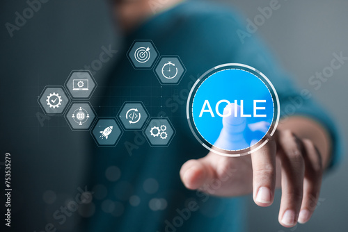 Agile development methodology concept, iterative methods. reducing step by step work and focusing on team. Person touching Agile software development principle on virtual screen. photo