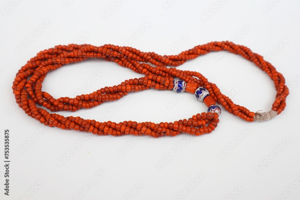 The Anahida or Muti Salak bead necklace is a typical necklace from East Nusa Tenggara. Isolated on white background. The Anahida or Muti Salak bead necklace is a typical necklace from East Nusa Tenggara. Isolated on white background.