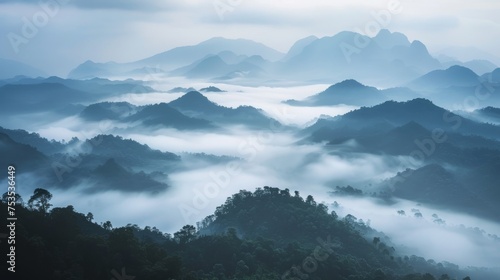 Misty mountains in the early morning, serene and mysterious © furyon