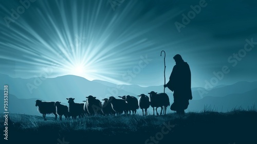Silhouette of Jesus Christ as a shepherd leading a flock through a valley. photo
