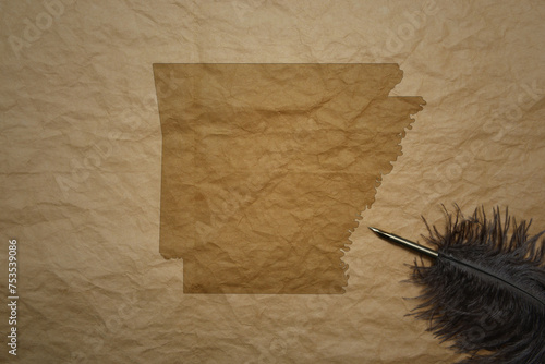 map of arkansas state on a old paper background with old pen