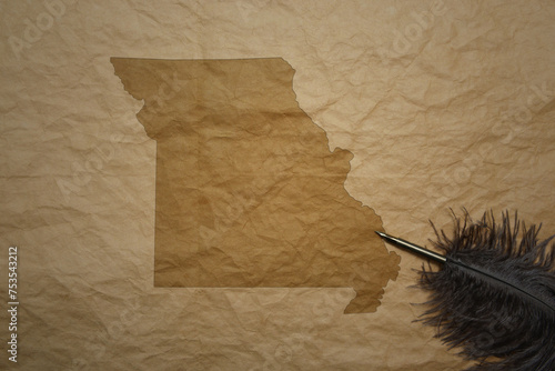 map of missouri state on a old paper background with old pen photo