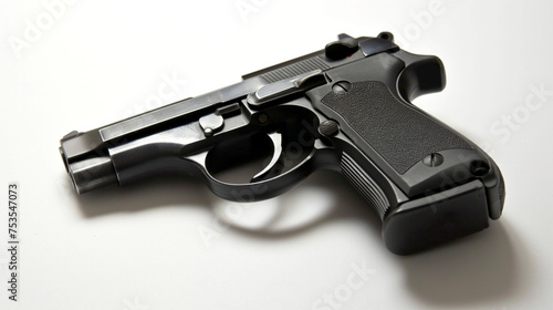 Automatic 9mm handgun pistol on a white background