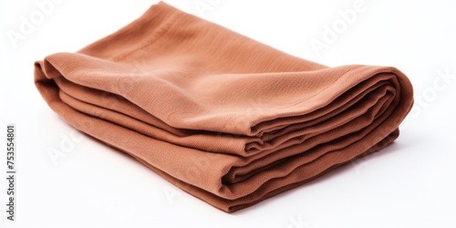 Brown beige kitchen towel, folded napkin isolated on white. Design element for food cloth decor.