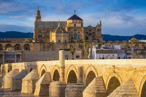 Roman bridge of Cordoba with Cathedral in the background in Andalusia, Spain