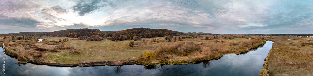 Aerial panorama on river curve in autumn valley Aerial panorama on river curve in autumn valley