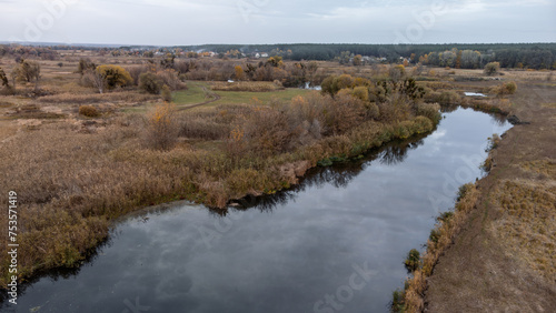 Fototapeta Naklejka Na Ścianę i Meble -  Aerial river scenery in autumn countryside