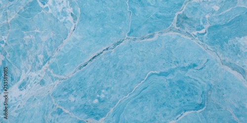 Closeup surface abstract light blue marble pattern at the marble stone floor texture background