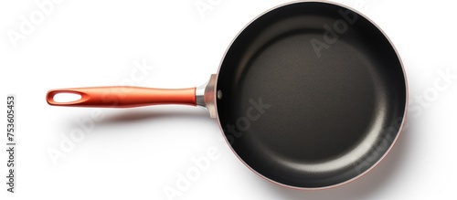 Sleek Black Cookware: A Kitchen Essential with a Bold Orange Accent Handle
