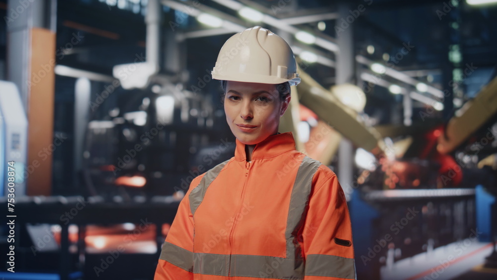 Production operator standing facility manufactory. Portrait of woman engineer Production operator standing facility manufactory. Portrait of woman engineer