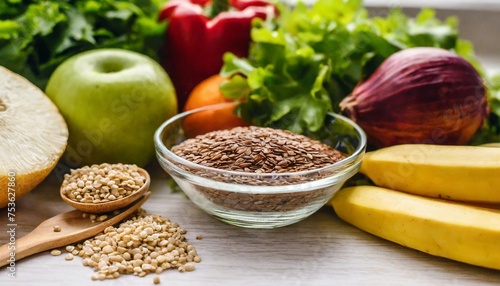 healthy food clean eating selection fruit vegetable seeds superfood cereal leaf vegetable in kitchen background
