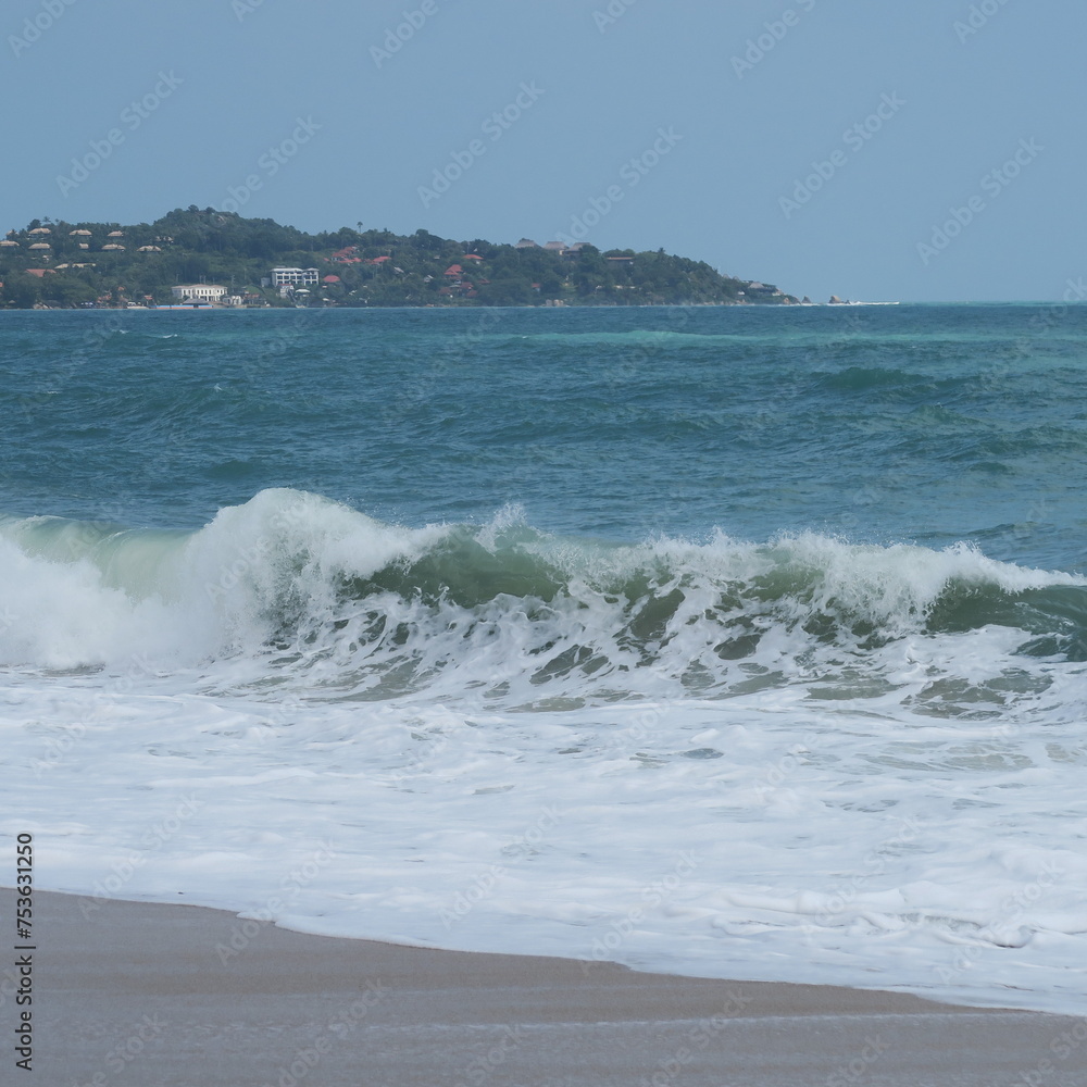 Fototapeta premium The Bay of Lamai, Ko Samui, Thailand, Asia at the end of January 2024 with lots of waves and swimming is prohibited
