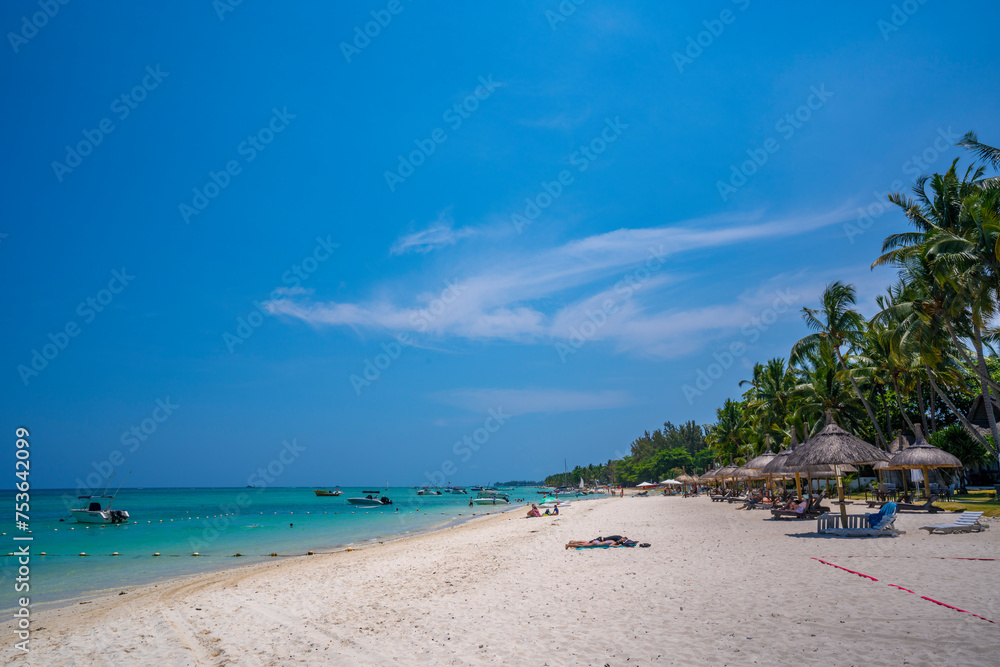 View of Beach at Trou-aux-Biches and turquoise Indian Ocean on sunny day, Trou-aux-Biches, Mauritius