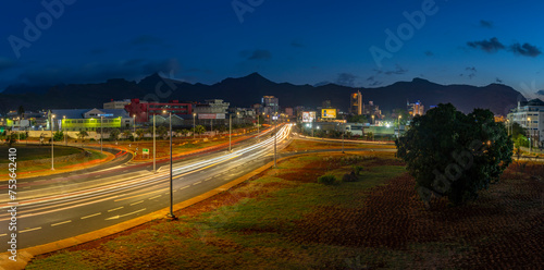View of trail lights and city skyline in Port Louis at dusk, Port Louis, Mauritius photo