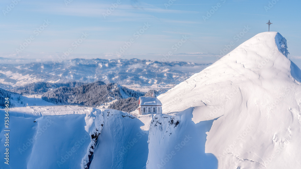 © robertharding - Church and cross on the descent from Mount Pilatus, Lake Lucerne, Switzerland © robertharding - Church and cross on the descent from Mount Pilatus, Lake Lucerne, Switzerland