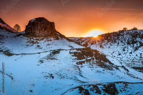 Sunset over Peter's Stone, Cressbrook Dale, near Litton, Peak District National Park, Derbyshire, England photo