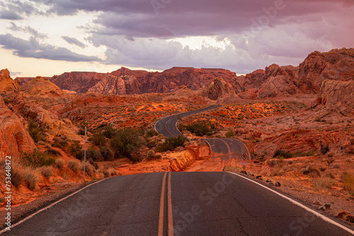 A majestic road crossing the beautiful Valley of Fire, Nevada, United States of America photo