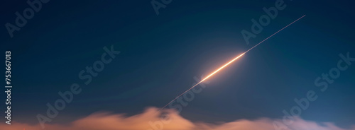 In the night sky, a missile interceptor zooms. It glows from the city lights. It defends the city against missiles.