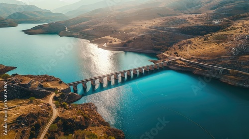 Water dam and reservoir lake aerial panoramic view photo