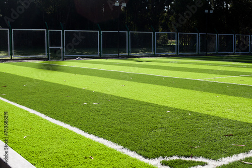 Photograph of a synthetic soccer field. Concept of sports industries.