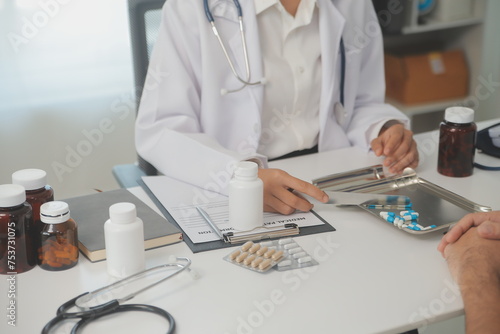 Healthcare service and pharmacy worker with customer at store counter for medication explanation. Pharmaceutical advice and opinion of pharmacist helping girl with medicine information.