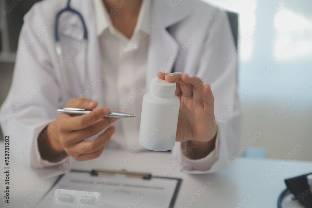 Healthcare service and pharmacy worker with customer at store counter for medication explanation. Pharmaceutical advice and opinion of pharmacist helping girl with medicine information. Healthcare service and pharmacy worker with customer at store counter for medication explanation. Pharmaceutical advice and opinion of pharmacist helping girl with medicine information.