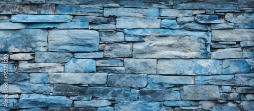 Weathered blue paint on a stone wall