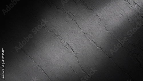 Texture of black stone or graphite with gradient. Abstract dark background