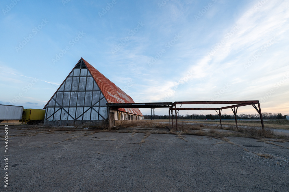 Obraz premium Old A Frame Truck Stop Barn with Red Roof Tiles