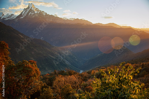 Sunset Rays Over Machapuchare Peak from Poon Hill, Nepal photo